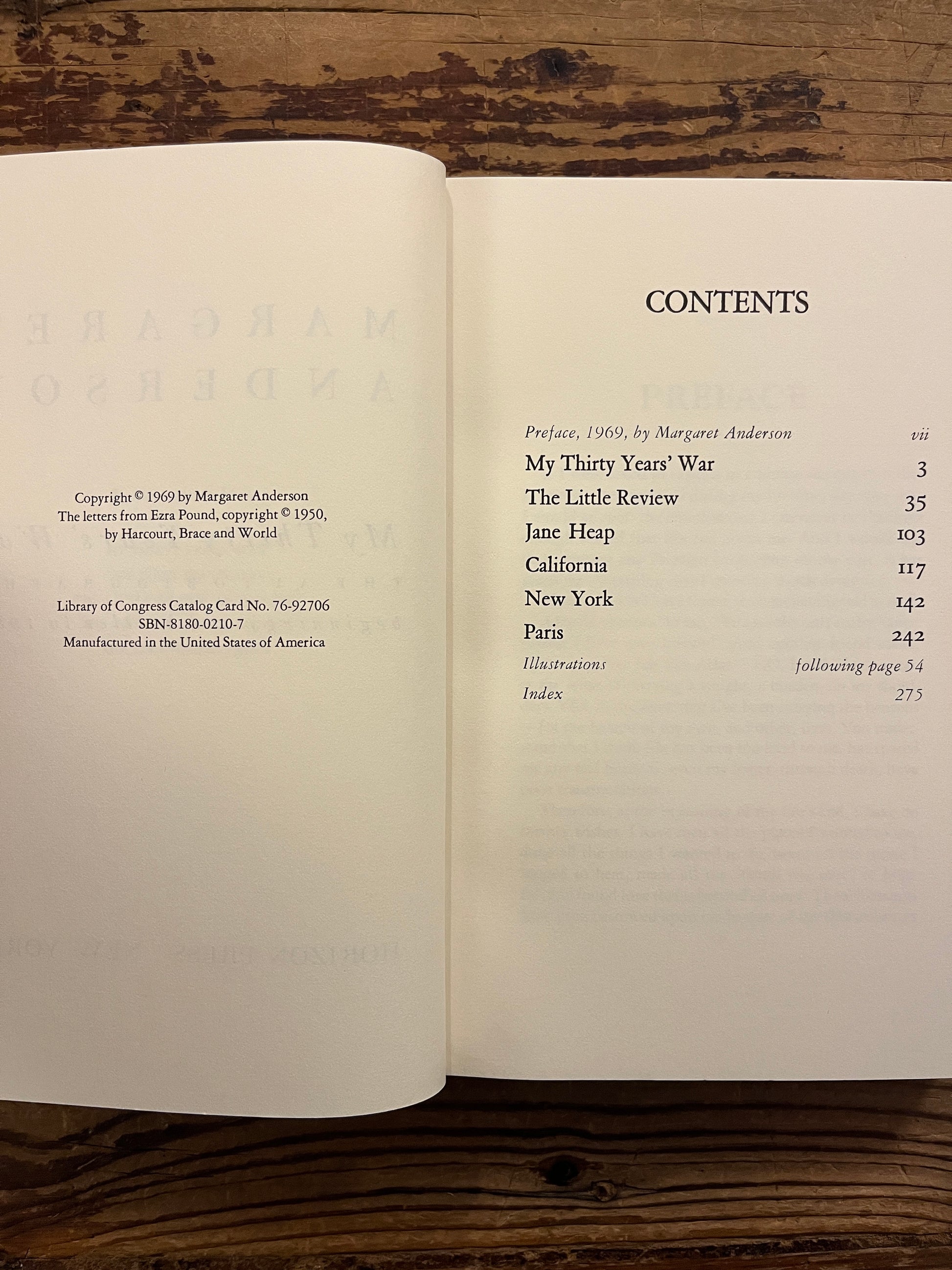 open book with the title 'My Thirty Years' War' by Margaret Anderson on a wooden surface