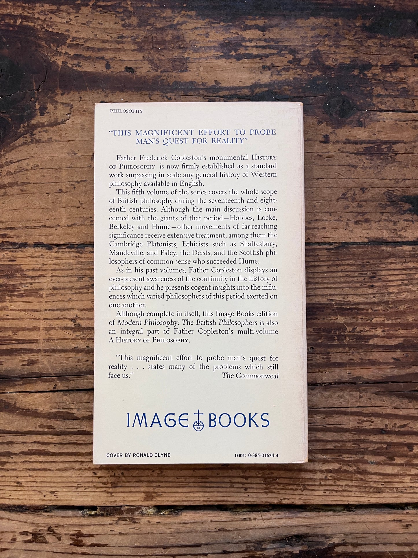 Photo of the cover of the book " a history of philosophy" on a wooden background