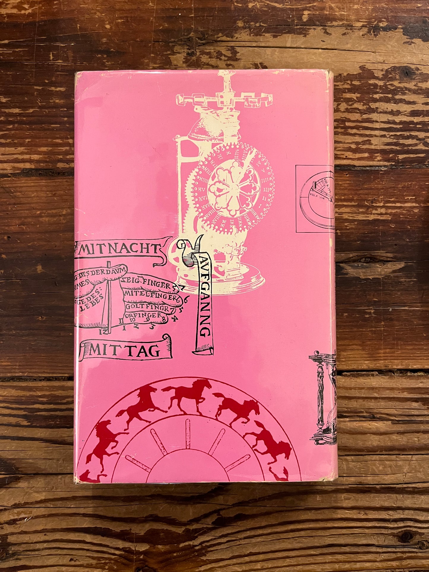 Back cover of book 'clockwork man' by Lawrence Wright  on a wooden surface 