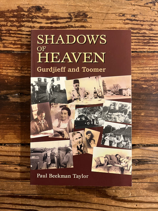Front cover of book titled 'Shadows of Heaven Gurdjieff and Toomer' by Paul Beekman Taylor on a wooden surface