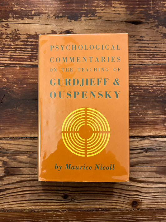 Book titled 'Psychological Commentaries on the Teaching of Gurdjieff & Ouspensky volume 4' by Maurice Nicoll on a wooden surface