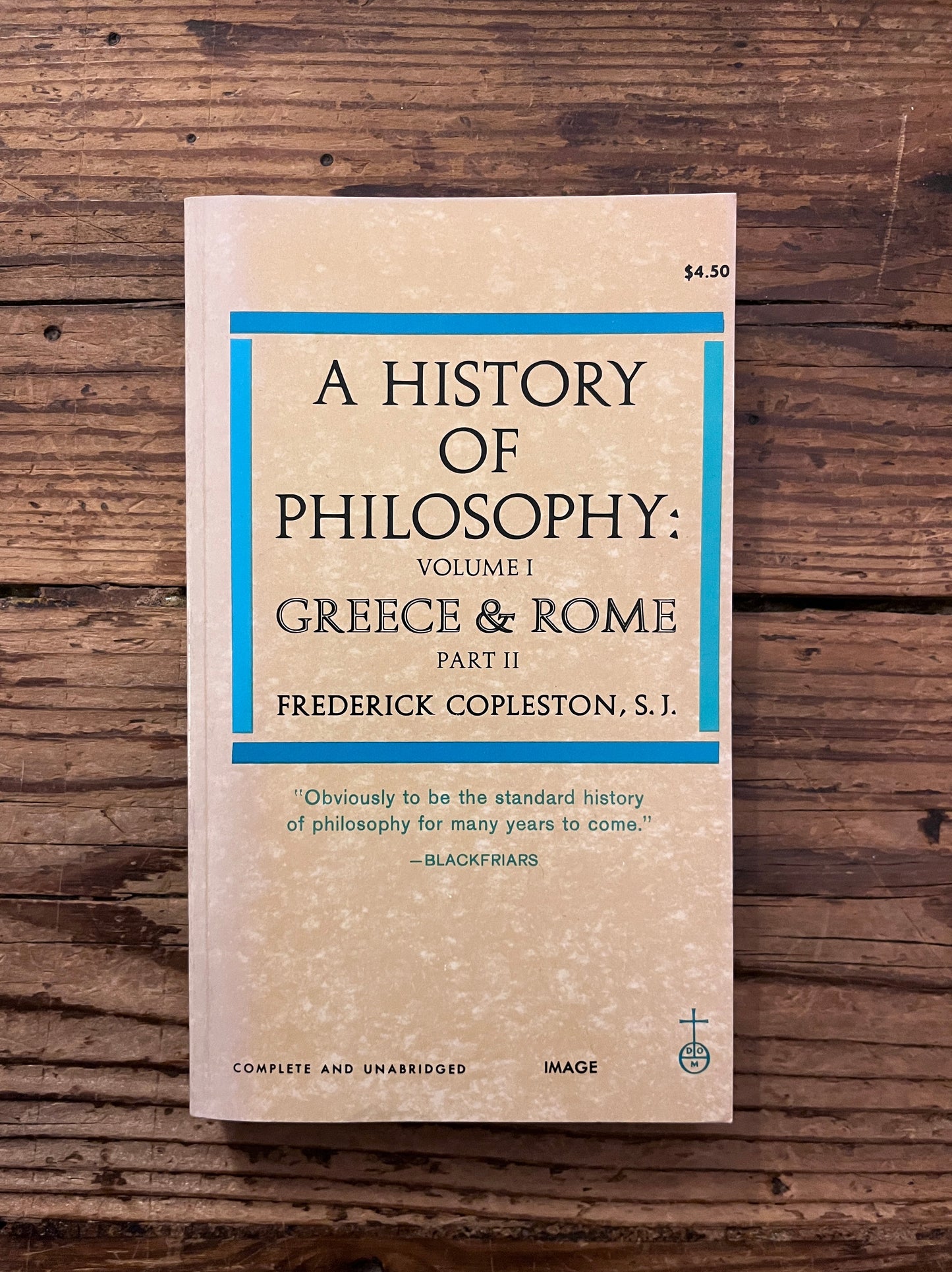 foto of the cover of the book "a history of philosophy" on a wooden background