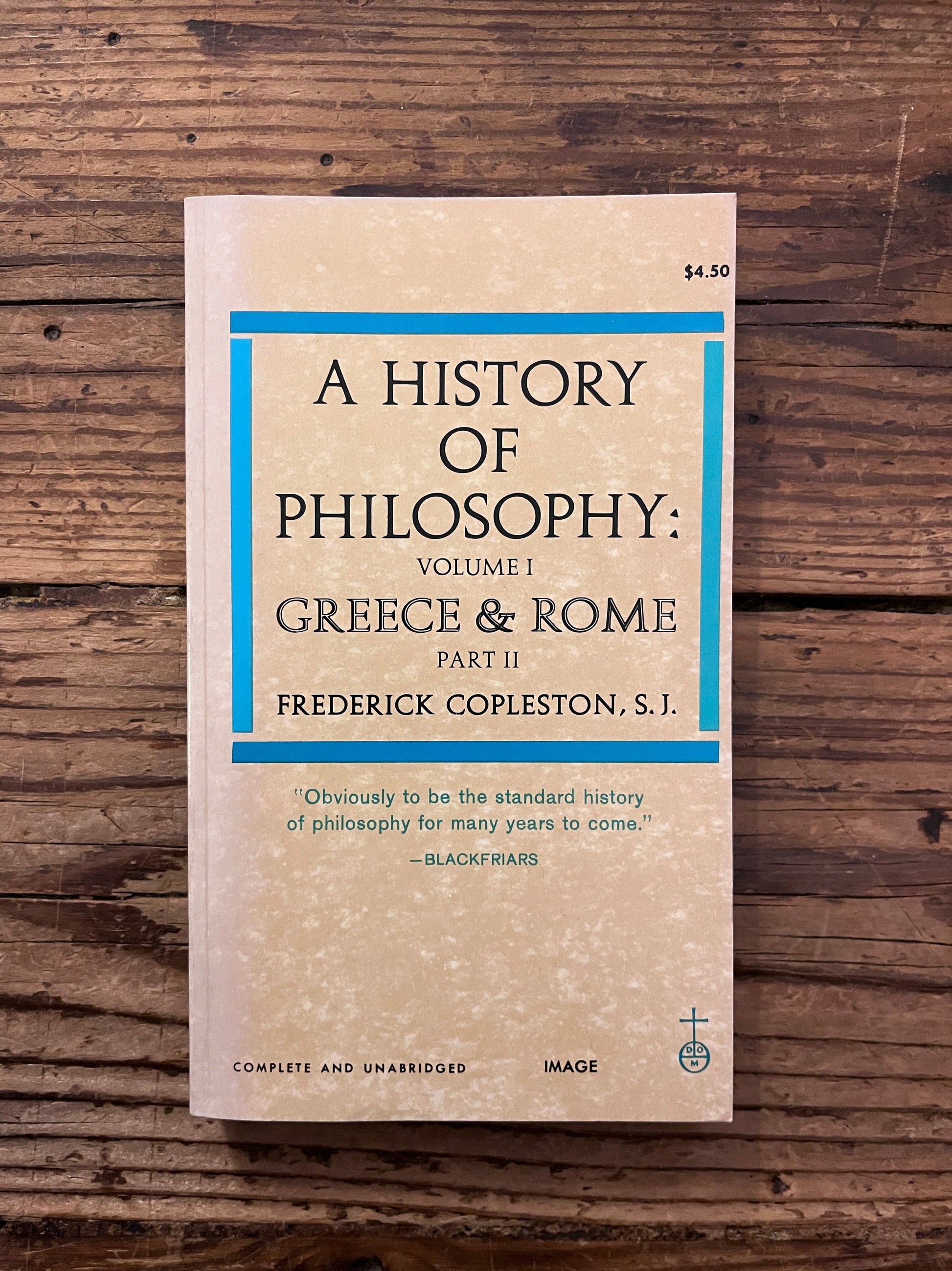 foto of the cover of the book "a history of philosophy" on a wooden background