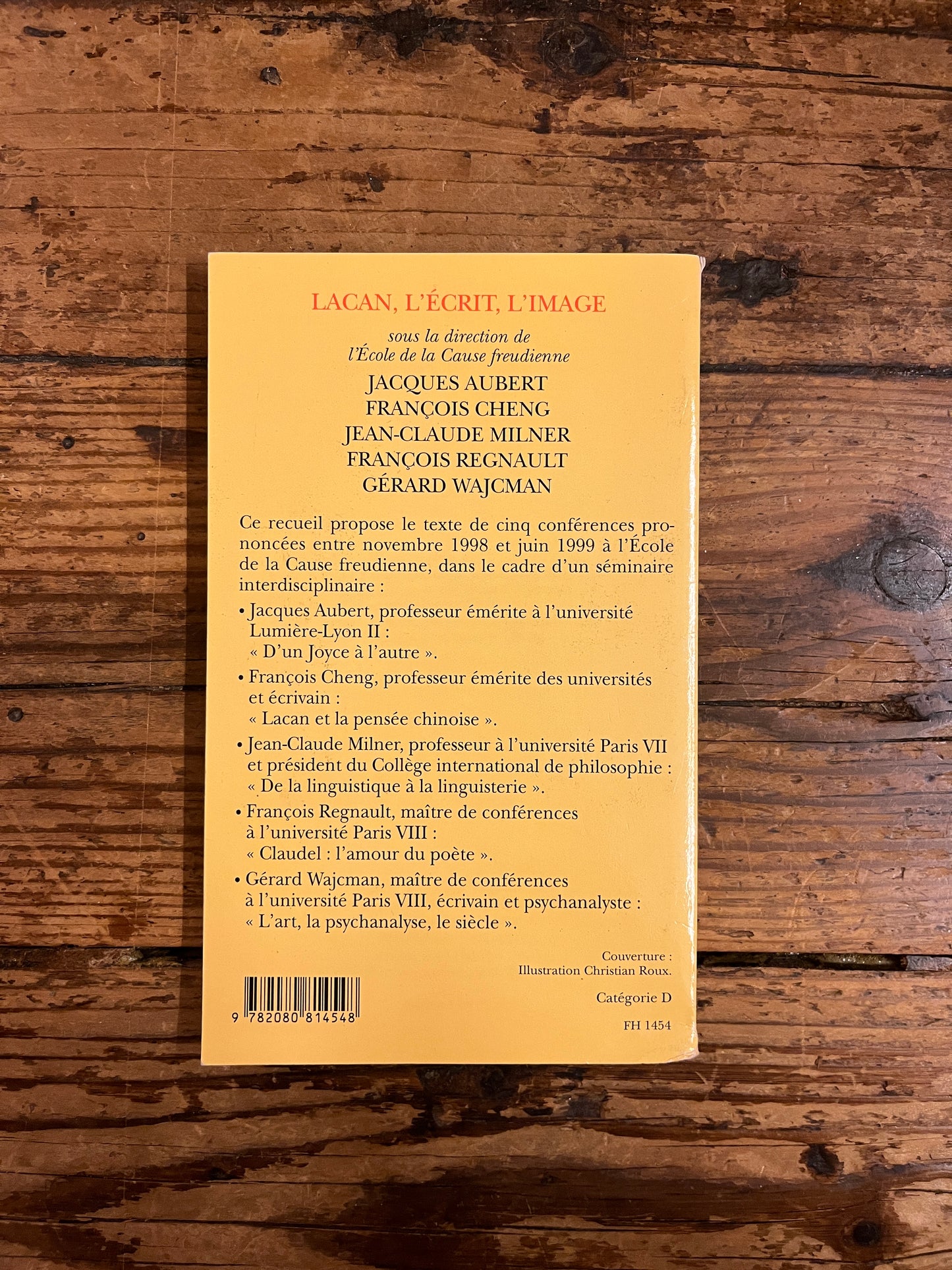 dos du livre  "lacan l'ecrit et l'image" sur fond de bois