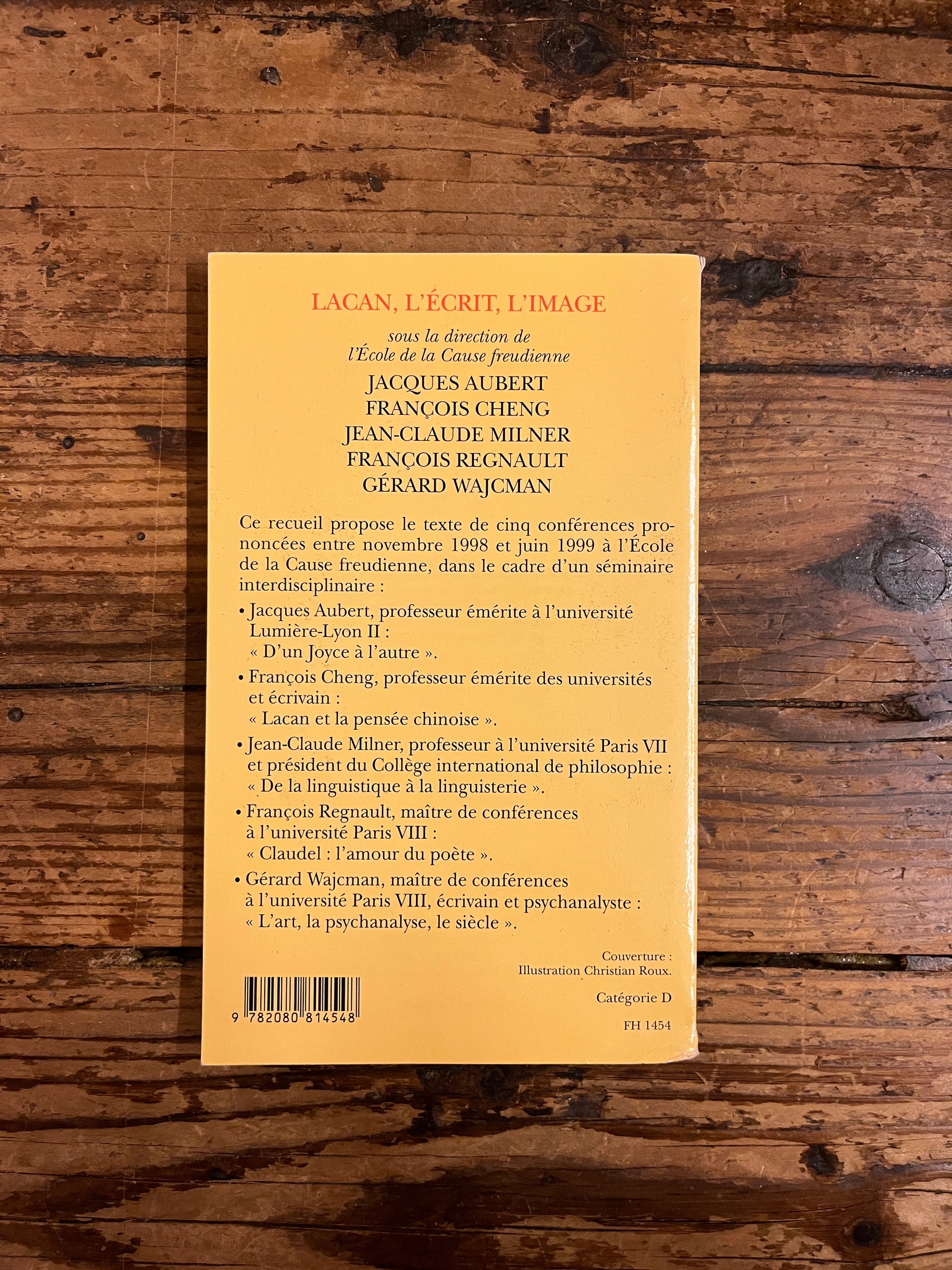 dos du livre  "lacan l'ecrit et l'image" sur fond de bois