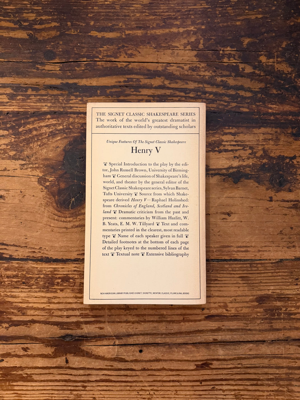 photo of the cover of the book "Henry V" on a wooden background