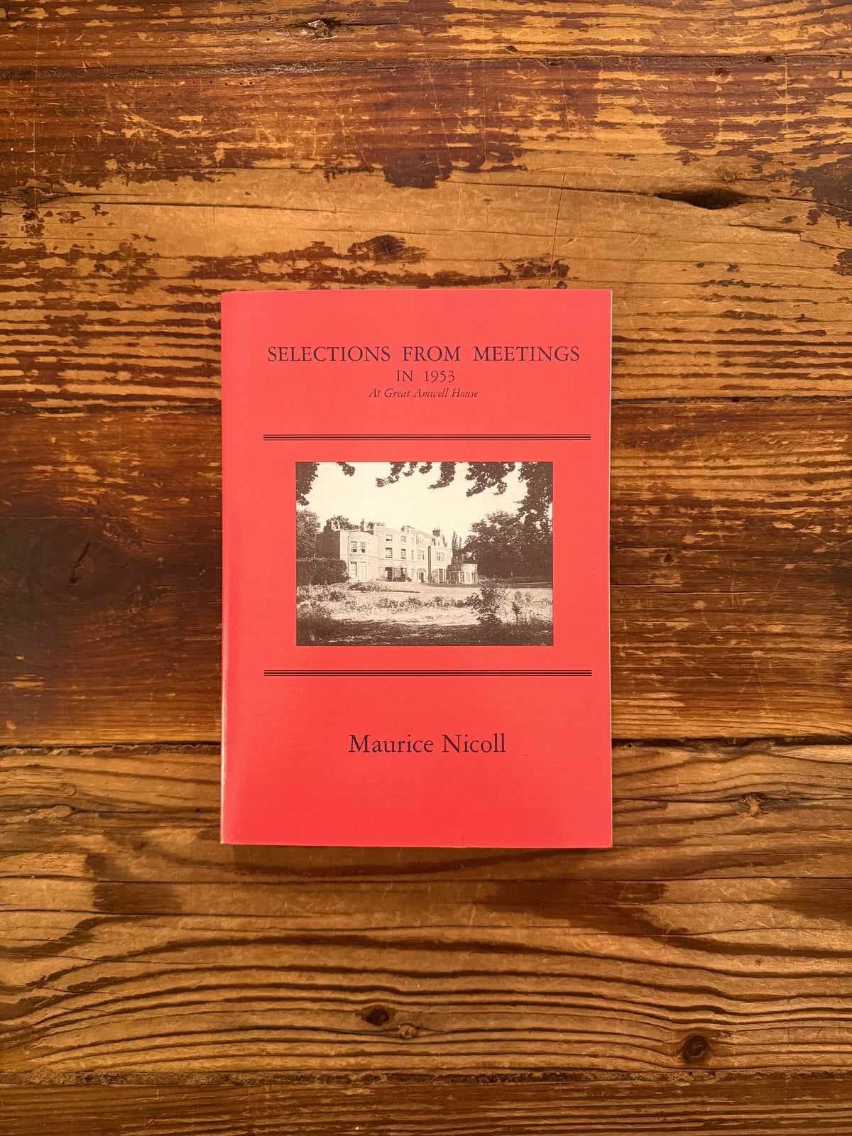 front cover of book with the title Selections from meetings 1953' by Maurice Nicoll on a wooden surface