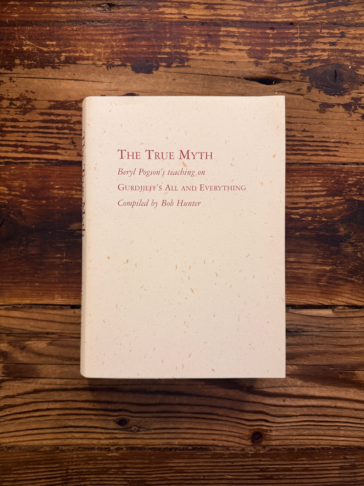 Front cover of book titled 'The True Myth' by Bob Hunter on a wooden surface