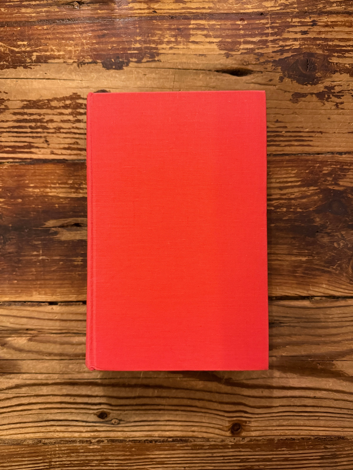 Front cover of book with the titled 'Memories, Dreams, Reflections' by C.G. Jung, 1st English Edition 1963, on a wooden surface 