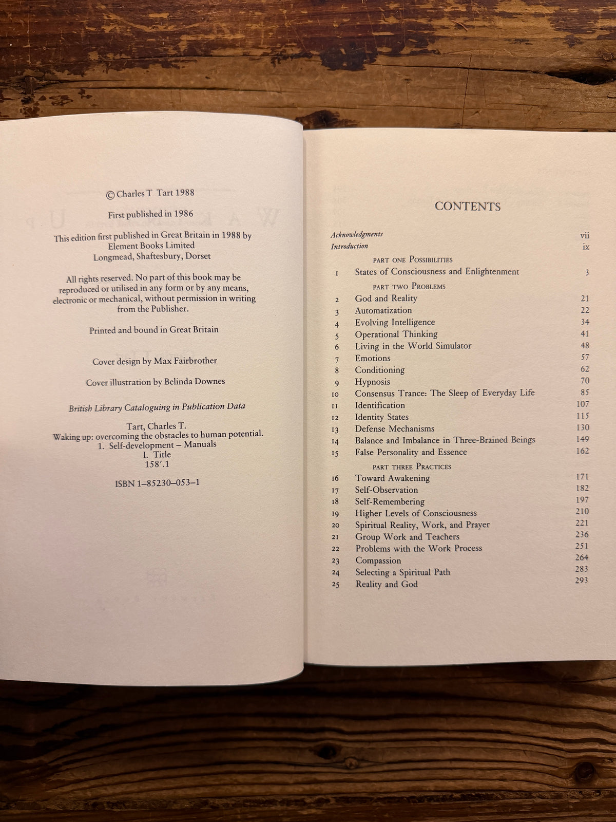 Open book with the title 'Waking up' by Charles T. Tart